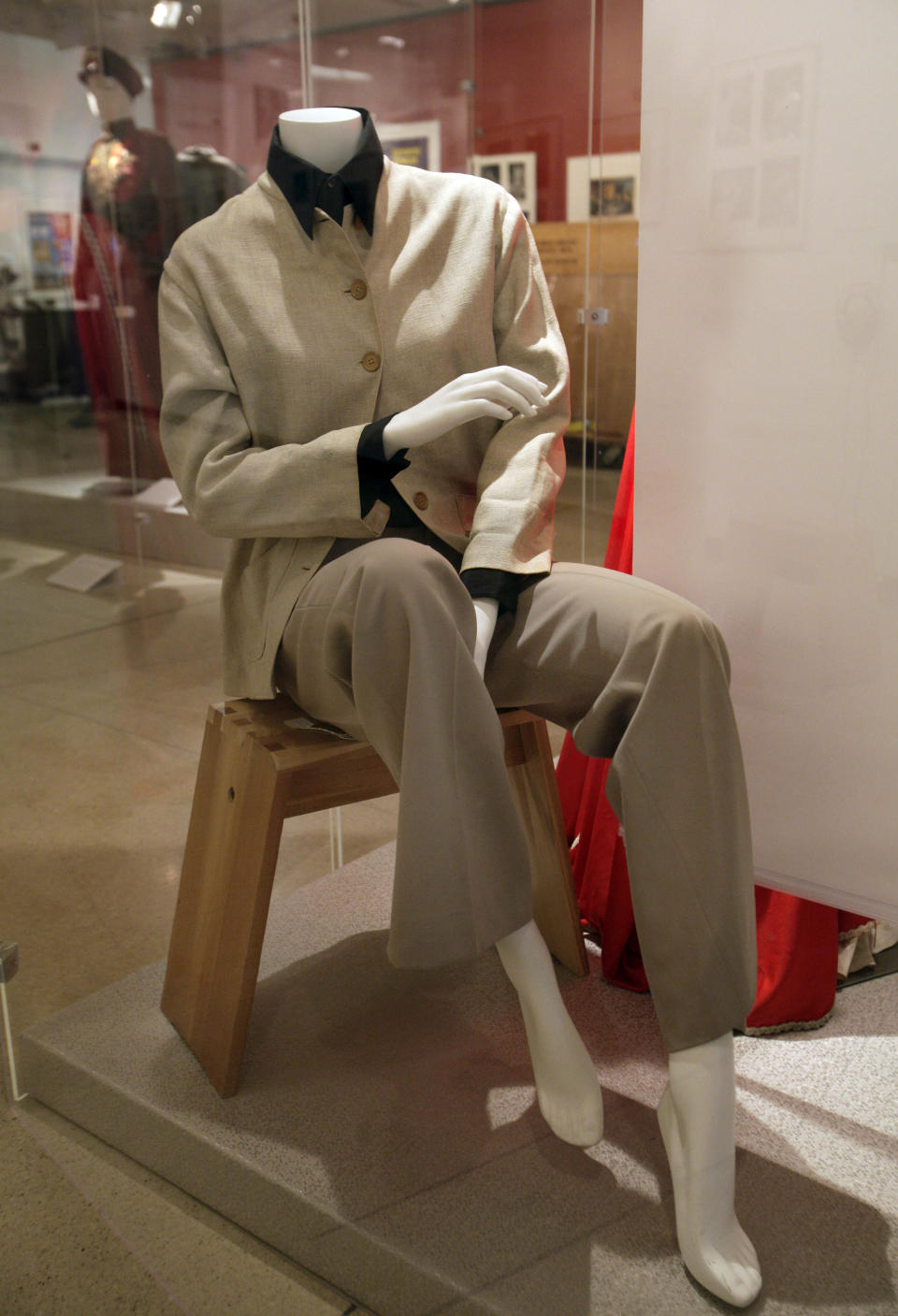 A suit worn during publicity photos for the 1967 movie "Guess Who's Coming to Dinner," is shown as part of the "Katharine Hepburn: Dressed for Stage and Screen" exhibit in the New York Public Library for the Performing Arts at Lincoln Center, Tuesday, Oct. 16, 2012. (AP Photo/Richard Drew)