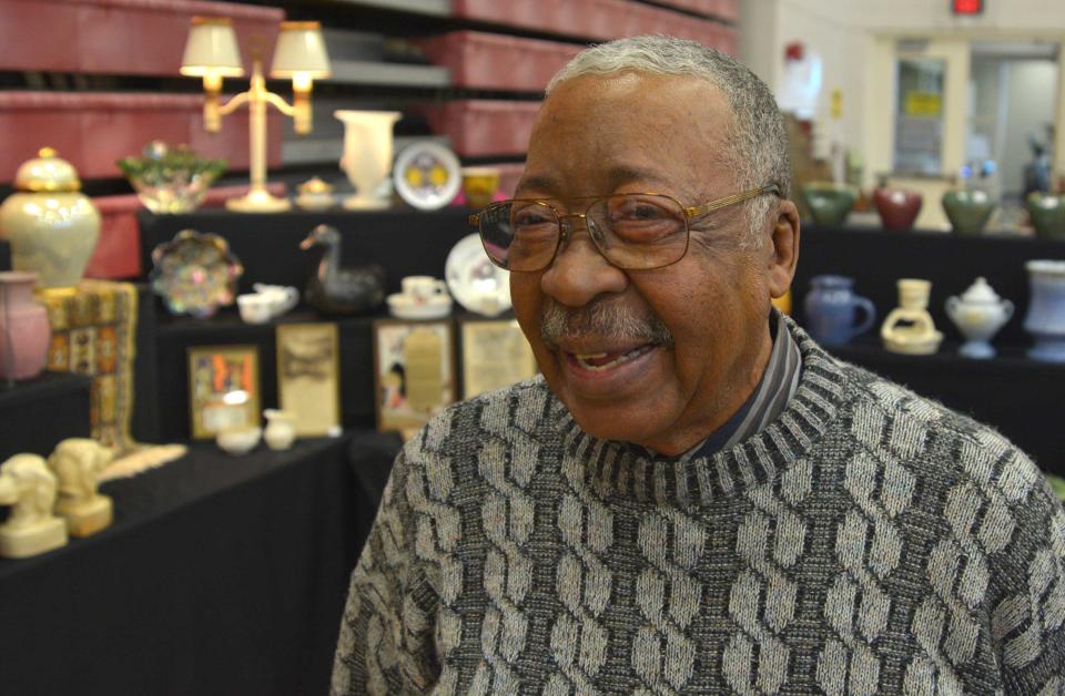 An exhibitor stands in front of his antique collection at the 2018 Antiques in April Show and Sale. This year's event is April 20-21.