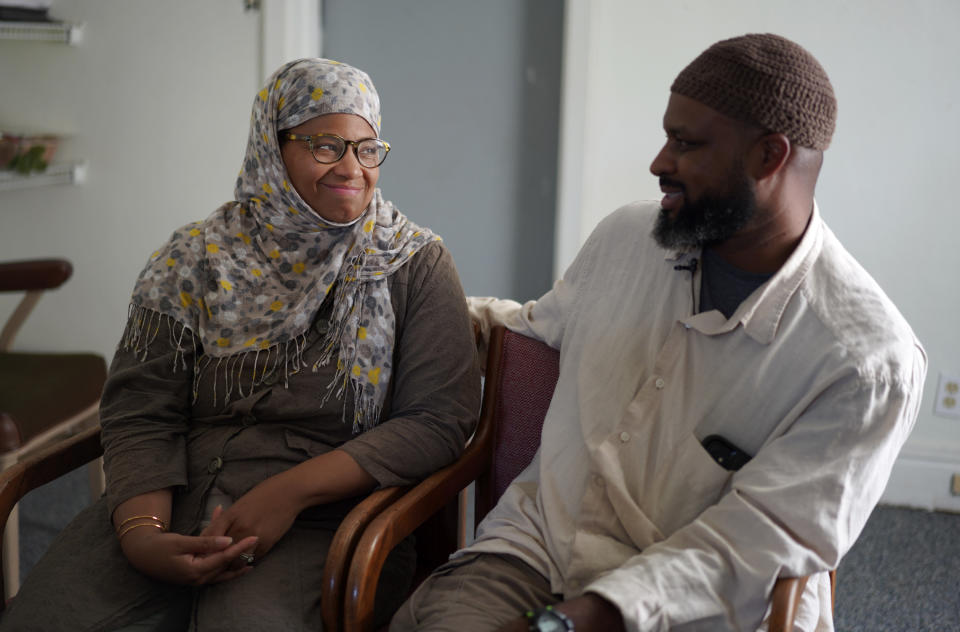 Suriyya Latif and her husband Junayd, longtime members of the Zion Ahmadiyya Muslim community, sit for an interview after a Friday prayer on Sept. 16, 2022, in Zion, Ill. (AP Photo/Jessie Wardarski)