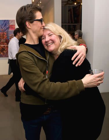 <p>ZUMA Press, Inc. / Alamy</p> Rachel Maddow and Susan Mikula at the opening reception for Mikula's 'American Vale' on March 17, 2011.