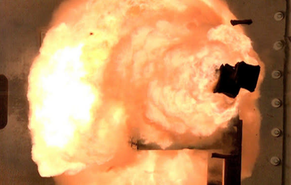 High-speed camera captures the first full-energy shots from the Office of Naval Research-funded electromagnetic railgun prototype launcher that was recently installed at a test facility in Dahlgren, Va.