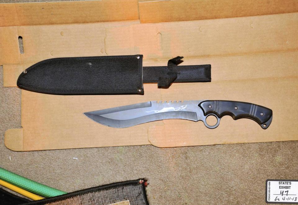 Although Charles Bryant had several days to dispose of potential evidence, investigators found several incriminating items at his home, including this large military style knife that later tested positive for the presence of blood. / Credit: Grapevine Police Department