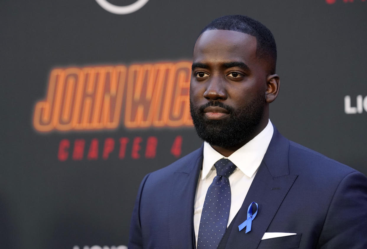 Shamier Anderson, a cast member in "John Wick: Chapter 4," poses at the premiere of the film, Monday, March 20, 2023, at the TCL Chinese Theatre in Los Angeles. (AP Photo/Chris Pizzello)