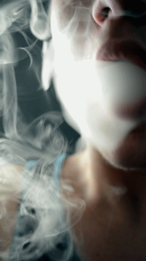 GIF of woman vaping