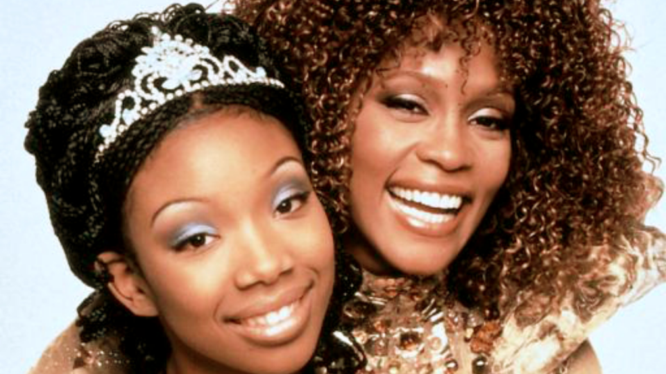 With her lead role in "Cinderella," Brandy, left, became the first Black actress to play the classic fairytale character onscreen. Whitney Houston played her Fairy Godmother.