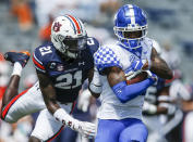 Kentucky wide receiver Allen Dailey Jr. (89) is tacked by Auburn defensive back Smoke Monday (21) after a reception during the second quarter of an NCAA college football game on Saturday, Sept. 26, 2020, in Auburn, Ala. (AP Photo/Butch Dill)