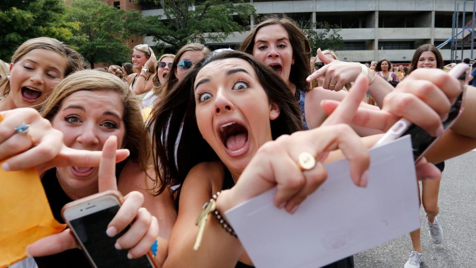 New sorority sisters join their sororities on Bid Day on Aug.  19, 2018 on Sorority Row outside Bryant-Denny Stadium. New members of Chi Omega show their excitement as they run down the street to their sorority house. [Staff Photo/Gary Cosby Jr.]