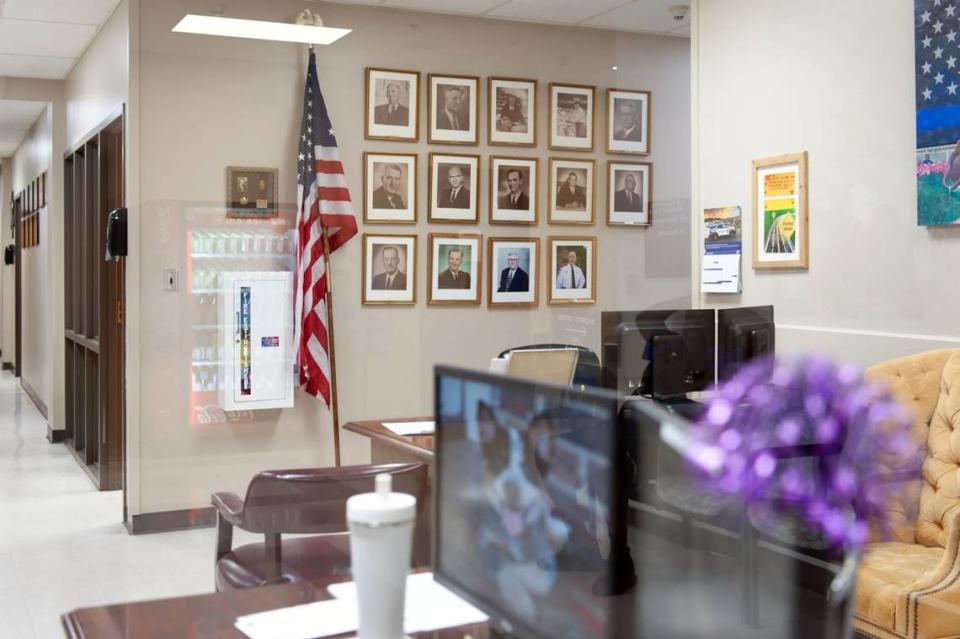 Portraits of Rankin County sheriffs over time are displayed inside the department. Under the current sheriff, deputies were allowed to operate with impunity for years.