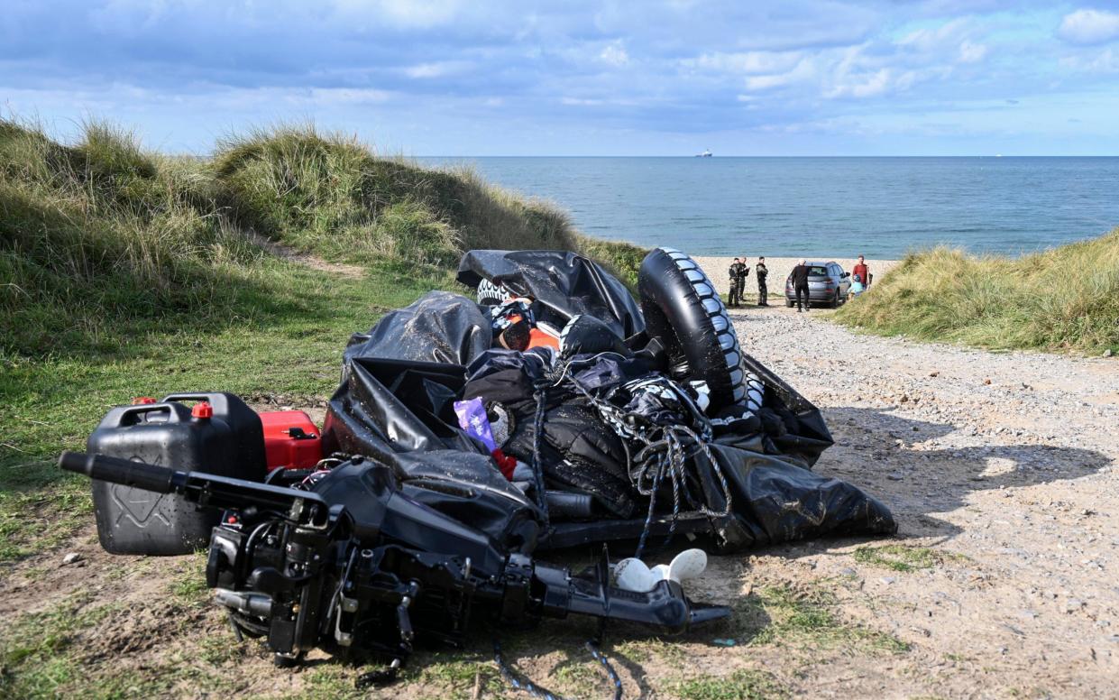 The wreckage of the boat that sank off the coast of northern France, leading to the deaths of eight migrants