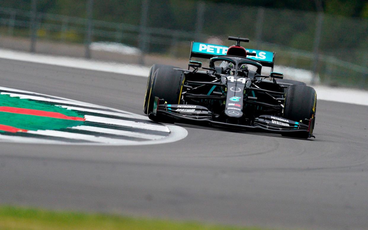 Mercedes' British driver Lewis Hamilton steers his car during the second practice session of the F1 70th Anniversary Grand Prix at Silverstone on August 7, 2020 in Northampton. - This weekend's race will commemorate the 70th anniversary of the inaugural world championship race, held at Silverstone in 1950. - AFP/ WILL OLIVER
