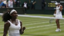 Serena Williams of the U.S.A. celebrates after winning her match against Heather Watson of Britain (R) at the Wimbledon Tennis Championships in London, July 3, 2015. REUTERS/Stefan Wermuth