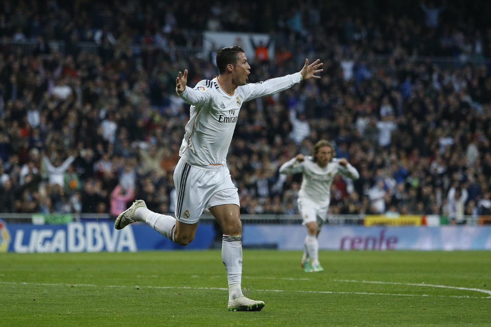 Real's Cristiano Ronaldo celebrates his goal during a Spanish La Liga soccer match between Real Madrid and Levante at the Santiago Bernabeu stadium in Madrid, Spain, Sunday, March 9, 2014. (AP Photo/Andres Kudacki)