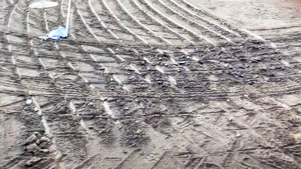 The greens and fairways, pictured here torn to shreds. 