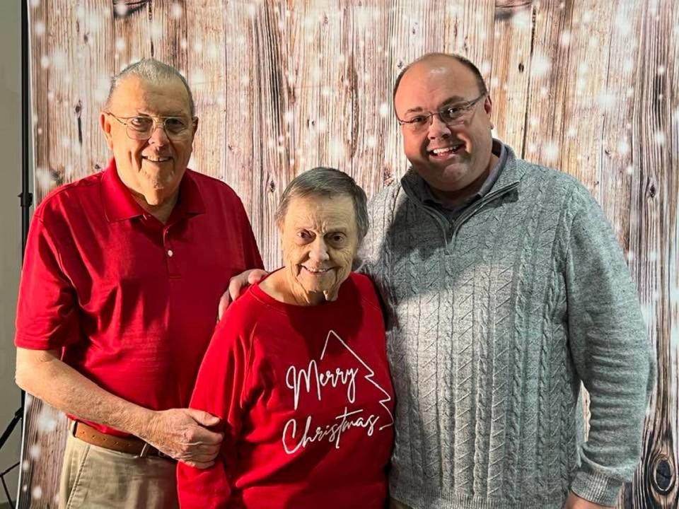 Josh Pettit, right, with her parents Bob and Betty at West Church in Mooresville for Christmas in 2021.