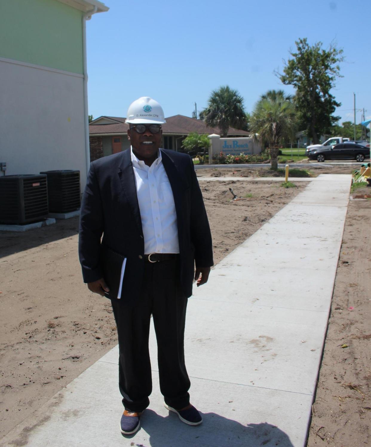 Dwayne Alexander, shown in a file photo, is the CEO of the Jacksonville Housing Authority. He is working without a contract after the housing authority board held off on giving him a pay raise because the mayor's office raised concerns about the salary increase.