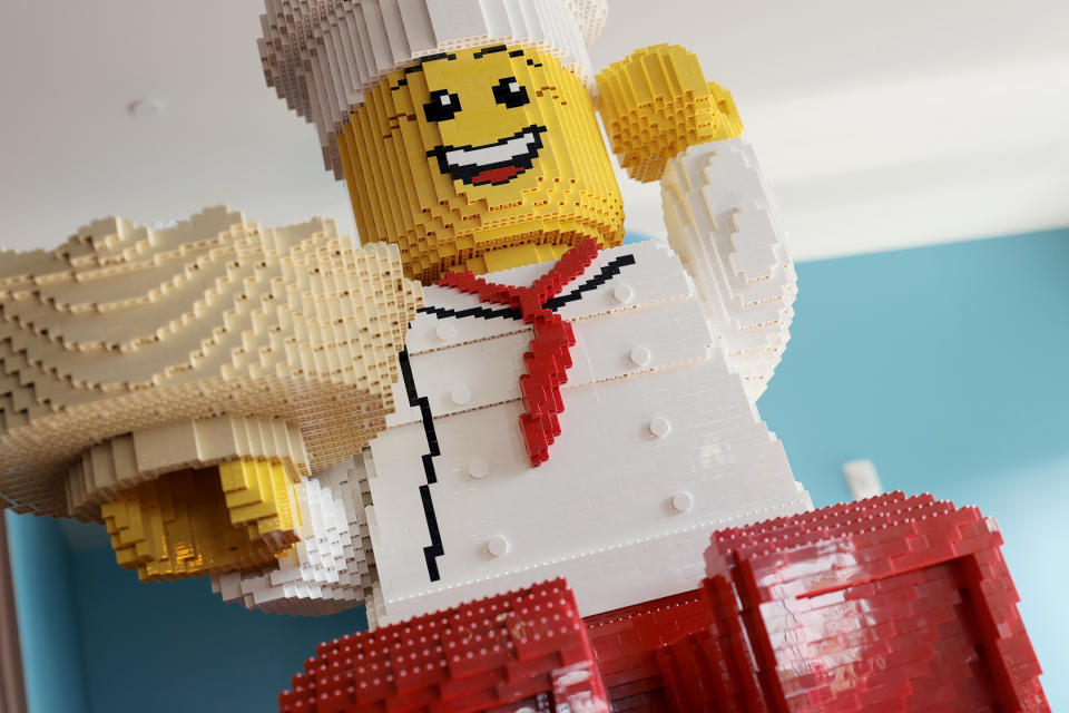 GOSHEN, NEW YORK - AUGUST 06: A LEGO character chef is stationed amongst guests eating in the BRICKS Family Restaurant inside the LEGOLAND New York Hotel during its grand opening at the LEGOLAND Resort on August 06, 2021 in Goshen, New York. (Photo by Michael Loccisano/Getty Images)