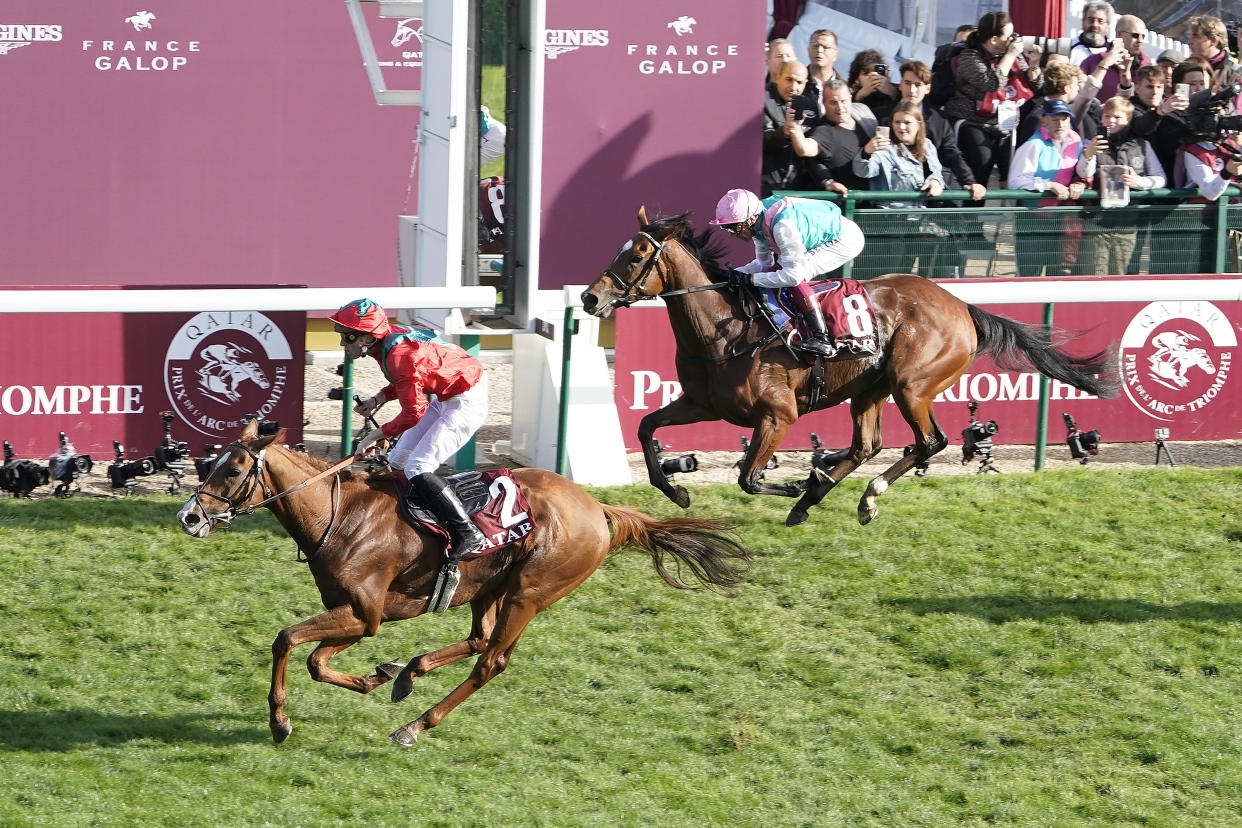 Pierre-Charles Boudot, riding Waldgeist, wins the Qatar Prix De L'Arc De Triomphe from Frankie Dettori and Enable, ending her bid to become the first horse to win Europe's richest race three times.