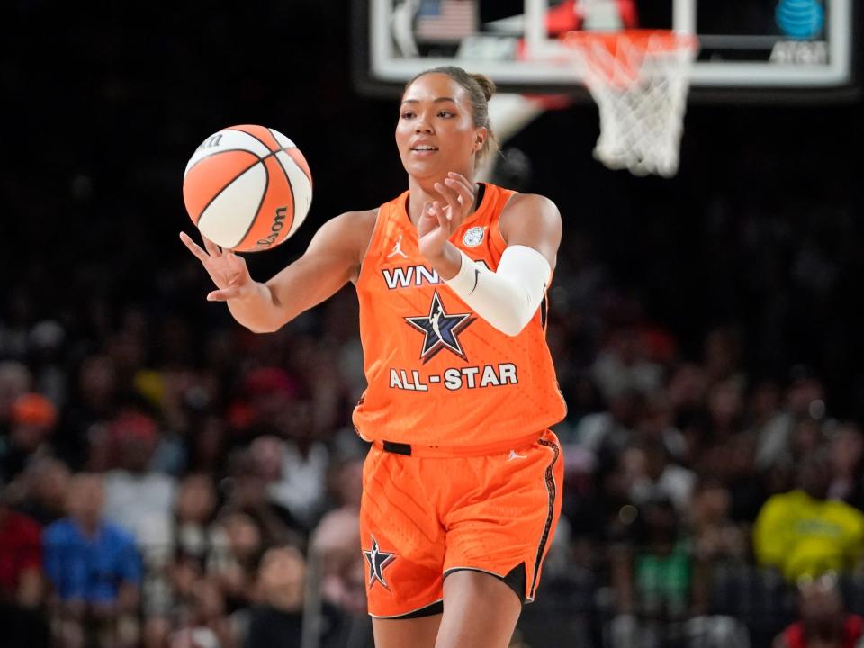 Napheesa Collier passes the ball during the 2023 WNBA All-Star Game.