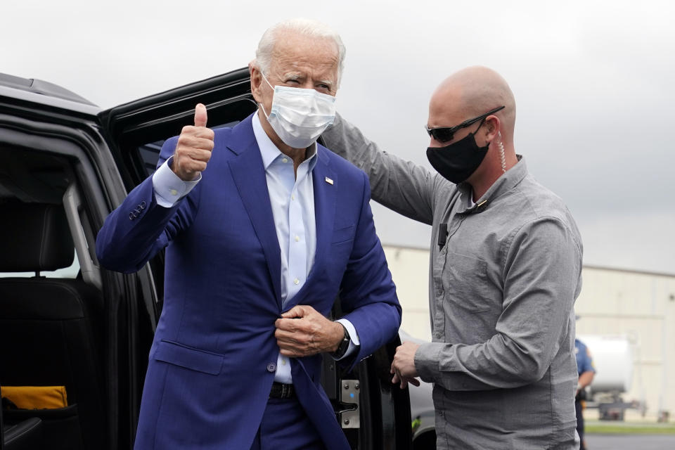 Democratic presidential candidate former Vice President Joe Biden arrives to board a plane at New Castle Airport in New Castle, Del., Wednesday, Sept. 9, 2020, en route to campaign events in Michigan. (AP Photo/Patrick Semansky)