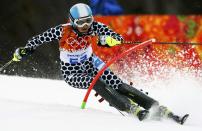 Argentina's Macarena Simari Birkner clears a gate during the first run of the women's alpine skiing slalom event at the 2014 Sochi Winter Olympics at the Rosa Khutor Alpine Center February 21, 2014. REUTERS/Ruben Sprich (RUSSIA - Tags: SPORT SKIING OLYMPICS)