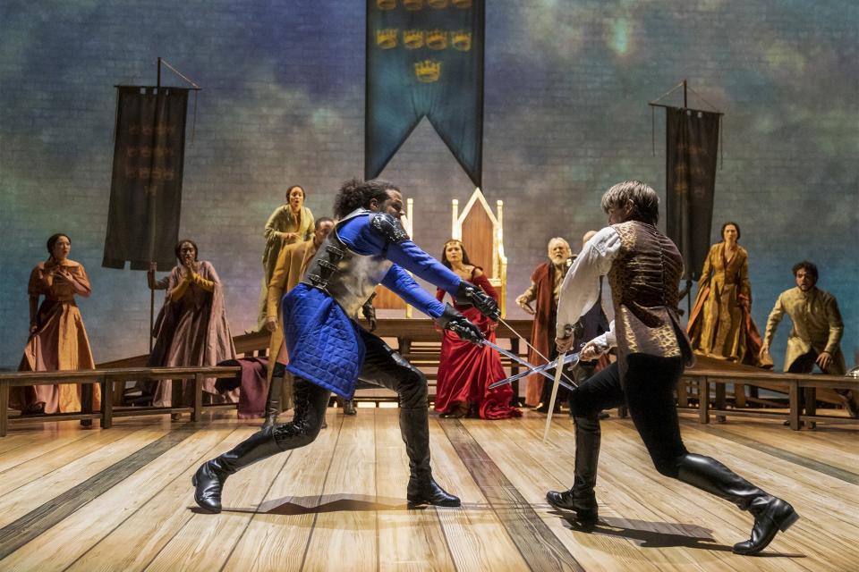 LCT Camelot #346r - Jordan Donica, Phillipa Soo (background), Andrew Burnap and the company in Lincoln Center Theater's production of CAMELOT. Credit to Joan Marcus