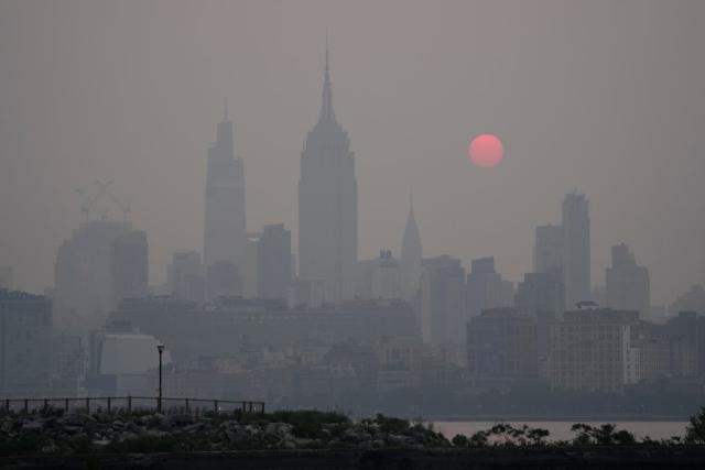 Canada wildfires clouds New York City sky for Yankees game