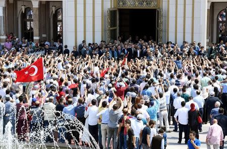 Turkish President Tayyip Erdogan addresses his supporters after the Friday prayers in Ankara, Turkey, July 22, 2016. Kayhan Ozer/Presidential Palace/Handout via REUTERS