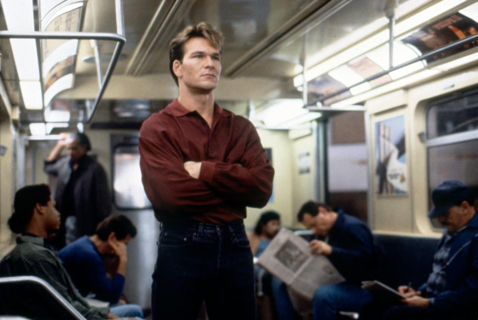 Patrick Swayze on a train on the set of the movie "Ghost."