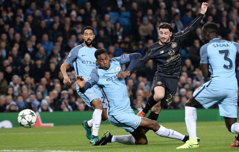 Patrick Roberts shoots past Manchester City's Oluwatosin Adarabioyo to score for Celtic at the Etihad Stadium in Manchester on December 6, 2016