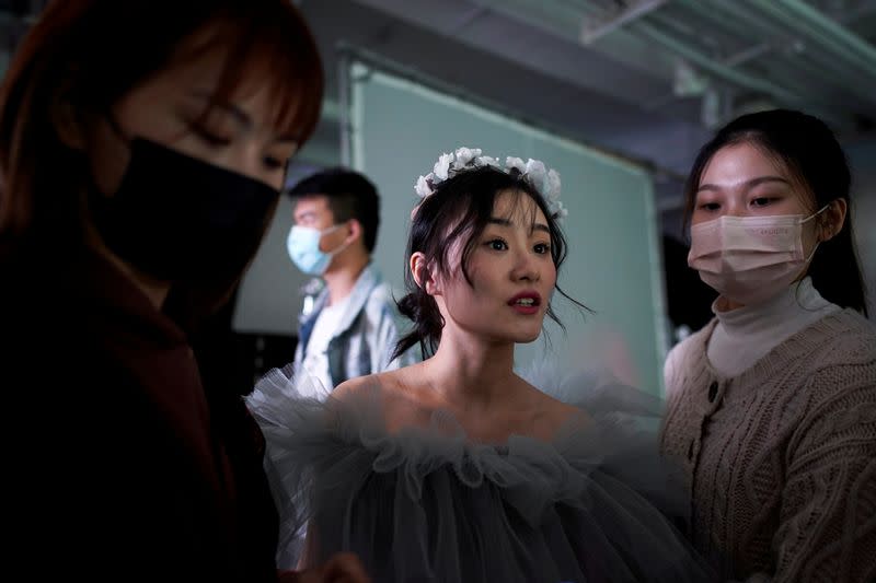 Peng Jing, 24, attends her wedding photography shoot after the lockdown was lifted in Wuhan