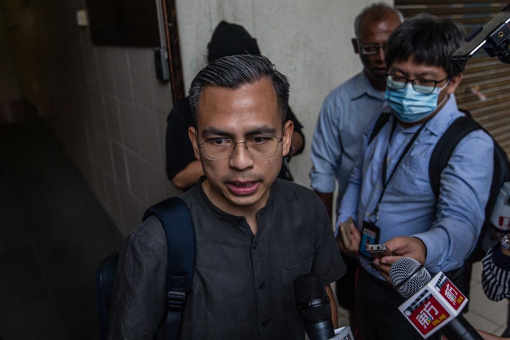 PKR communications director Fahmi Fadzil speaks to the press after a meeting with fellow Pakatan Harapan leaders in Petaling Jaya June 12, 2020. — Picture by Firdaus Latif