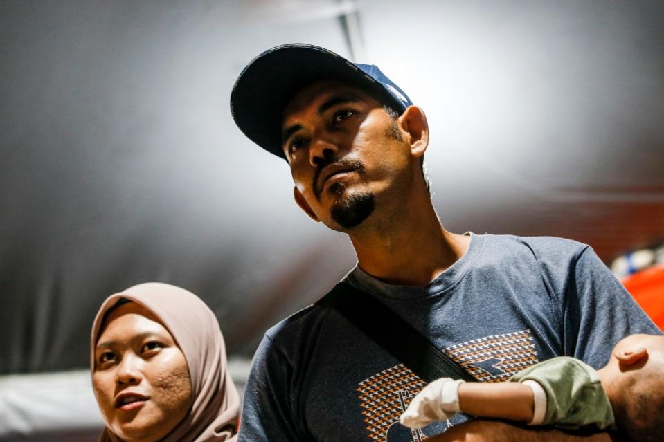 Mohd Firdaus Mokhtaruddin, 28, a second generation Felda settler, says there is only one petrol station and automated teller machine (ATM) in Pelangai. — Picture by Hari Anggara