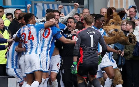 David Wagner celebrates with his players - Credit: reuters