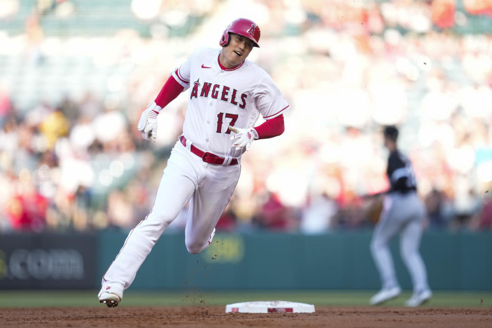 Los Angeles Angels designated hitter Shohei Ohtani (17) runs on a triple during the first inning of a baseball game against the Chicago White Sox in Anaheim, Calif., Wednesday, June 28, 2023. (AP Photo/Ashley Landis)