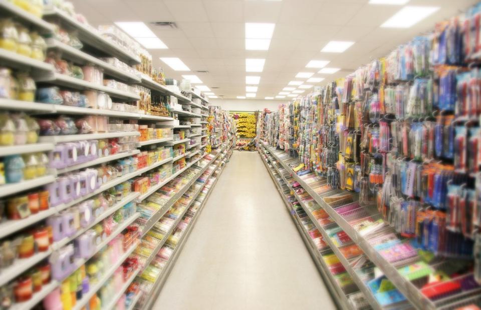 A store aisle lined with things to buy.