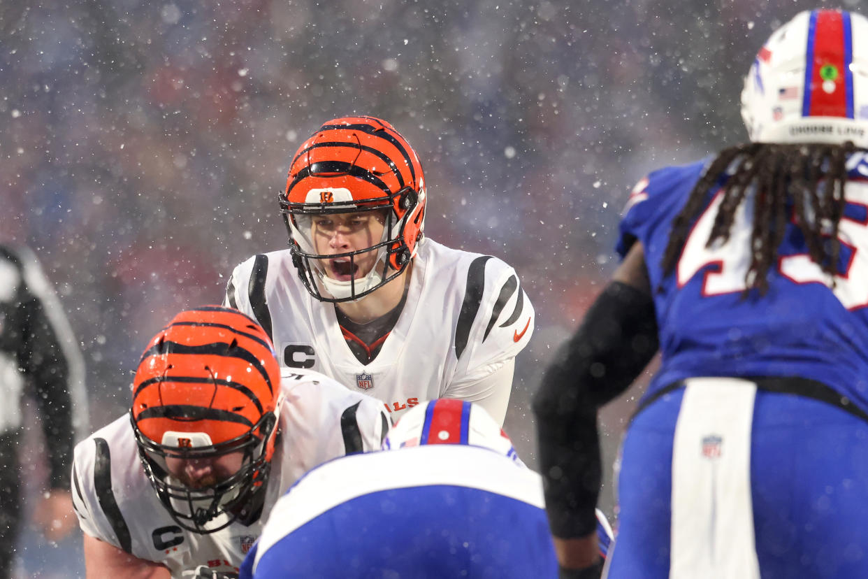 ORCHARD PARK, NEW YORK - JANUARY 22: Joe Burrow #9 of the Cincinnati Bengals calls a play against the Buffalo Bills during the third quarter in the AFC Divisional Playoff game at Highmark Stadium on January 22, 2023 in Orchard Park, New York. (Photo by Bryan M. Bennett/Getty Images)