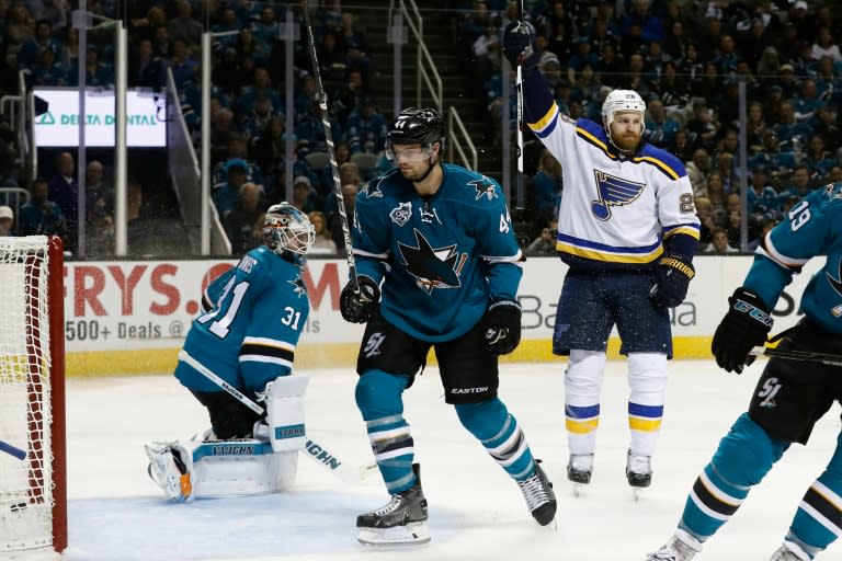 Kyle Brodziak (2R) of the St. Louis Blues celebrates after his first of two goals in game four of the Western Conference Finals against the San Jose Sharks