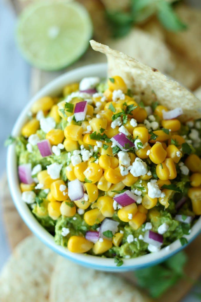 <strong>Get the <a href="http://damndelicious.net/2013/08/18/sweet-corn-grilled-guacamole/" target="_blank">Sweet Corn Grilled Guacamole recipe</a> from Damn Delicious</strong>