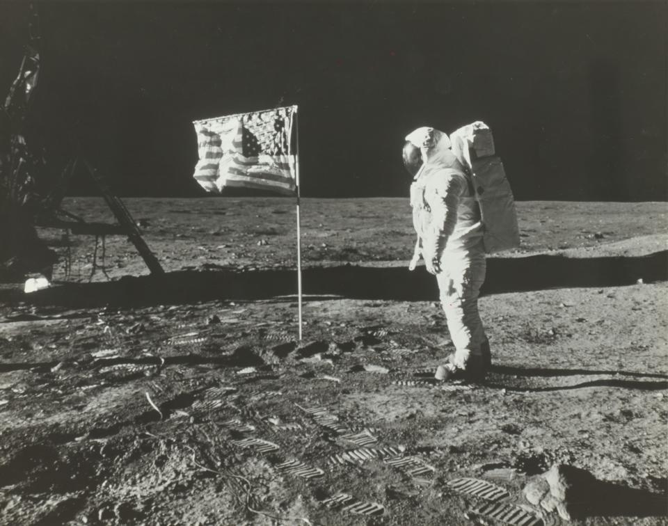 Buzz Aldrin on the Moon with the American Flag, 1969.