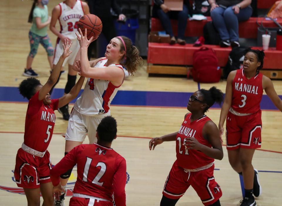 CAL’s Savannah Gardner (4) shoots against Manual defenders during their game at Christian Academy of Louisville in Louisville, Ky. on Mar. 23, 2021.  