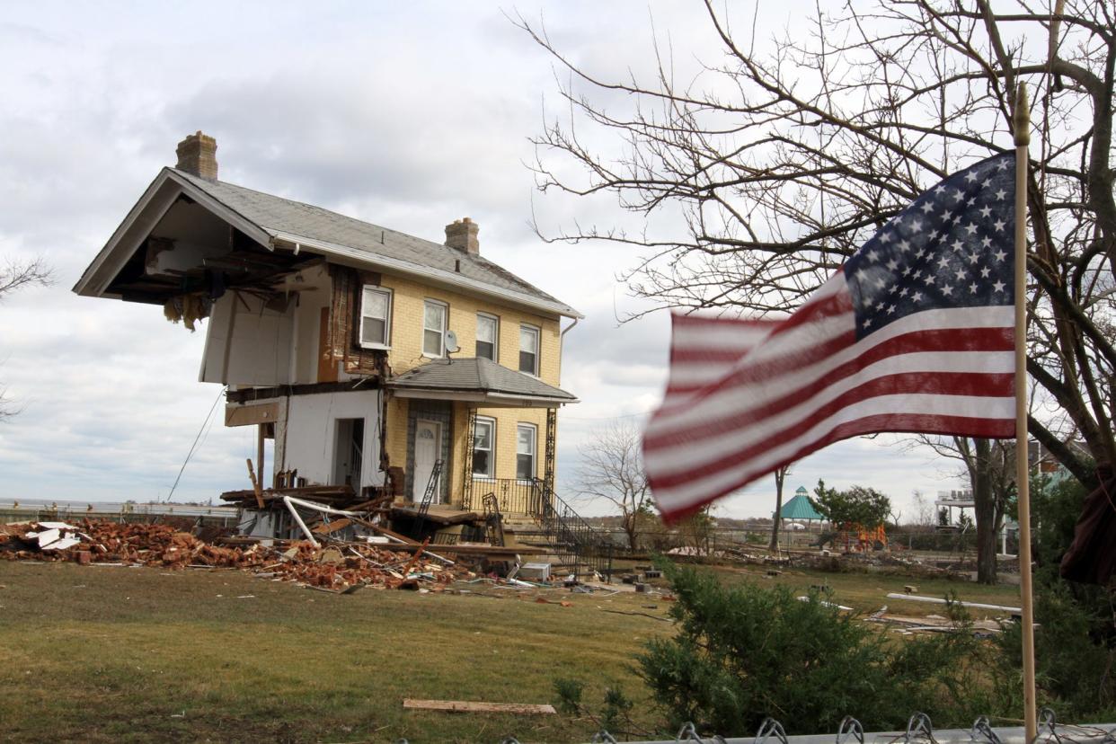 File photo of the Front Street home that was sheared in half during Superstorm Sandy in Union Beach in 2012.