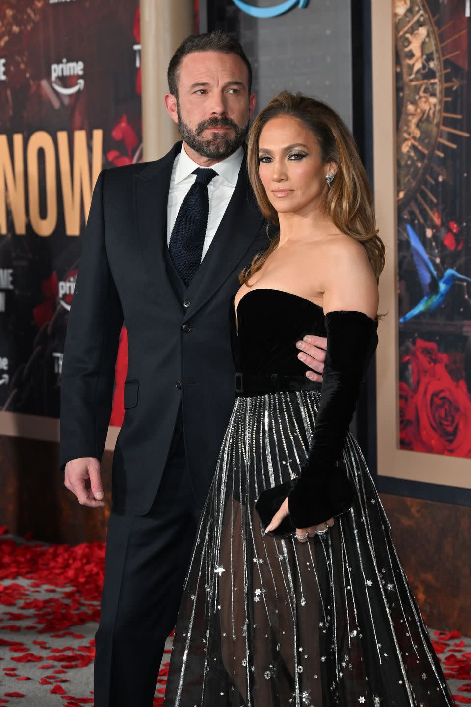 jennifer lopez and ben affleck pose on red carpet