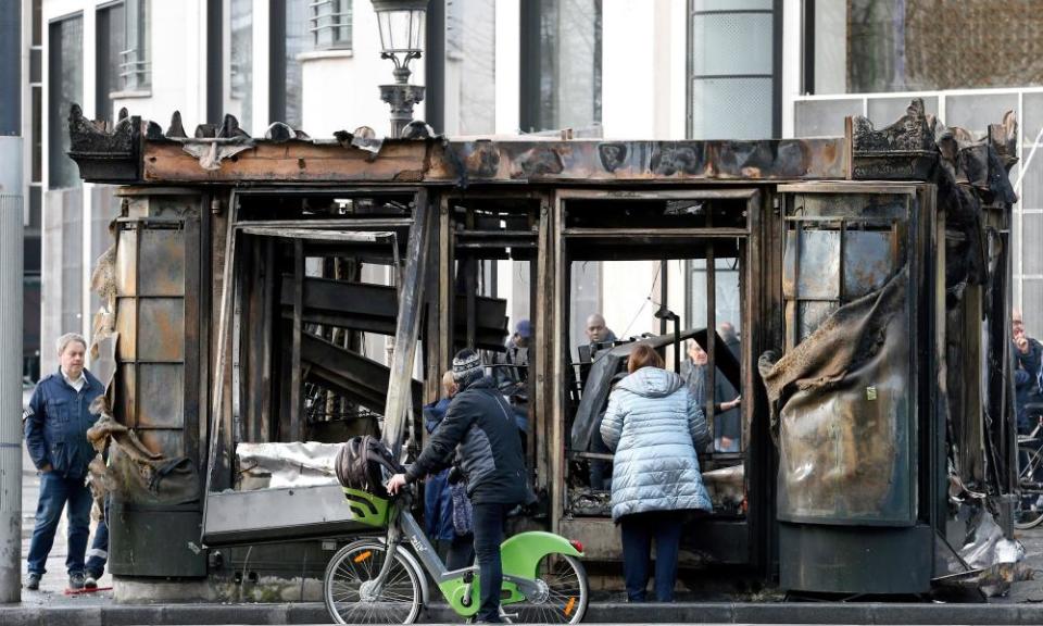 A burnt-out kiosk.