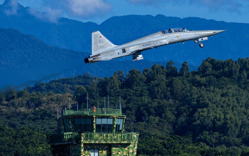 A Taiwanese F-5 fighter jet taking off from Chihhang Air Base on August 6 - Annabelle Chih /Getty Images