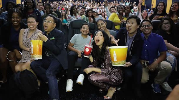 PHOTO:Nico Santos, Awkwafina and Ken Jeong pose with fans at Regal Cinemas 18 South Beach for the 'Crazy Rich Asians' screening, July 31, 2018 in Miami. (Alexander Tamargo/Getty Images)