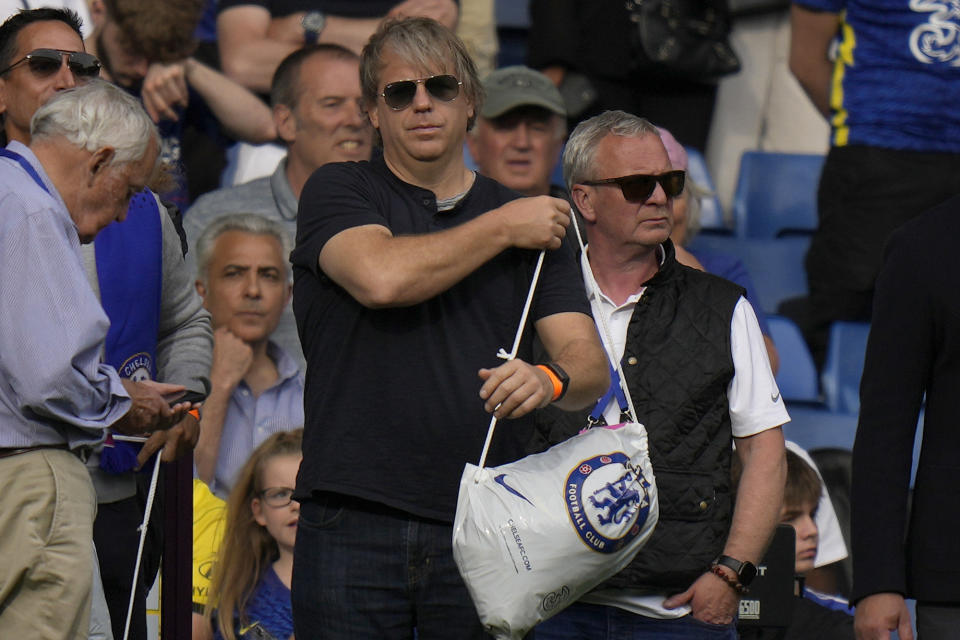 FILE - American businessman Todd Boehly attends the English Premier League soccer match between Chelsea and Watford at Stamford Bridge stadium in London, Sunday, May 22, 2022. The Premier League has approved the proposed sale of Chelsea to a consortium fronted by Los Angeles Dodgers part-owner Todd Boehly, although the U.K. government still needs to sign off on the deal before it can be completed. (AP Photo/Alastair Grant, File)