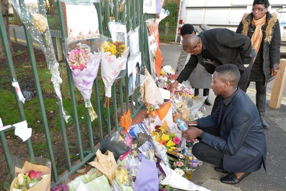 Relatives leave flowers at the scene of his death after the stabbing (PA)