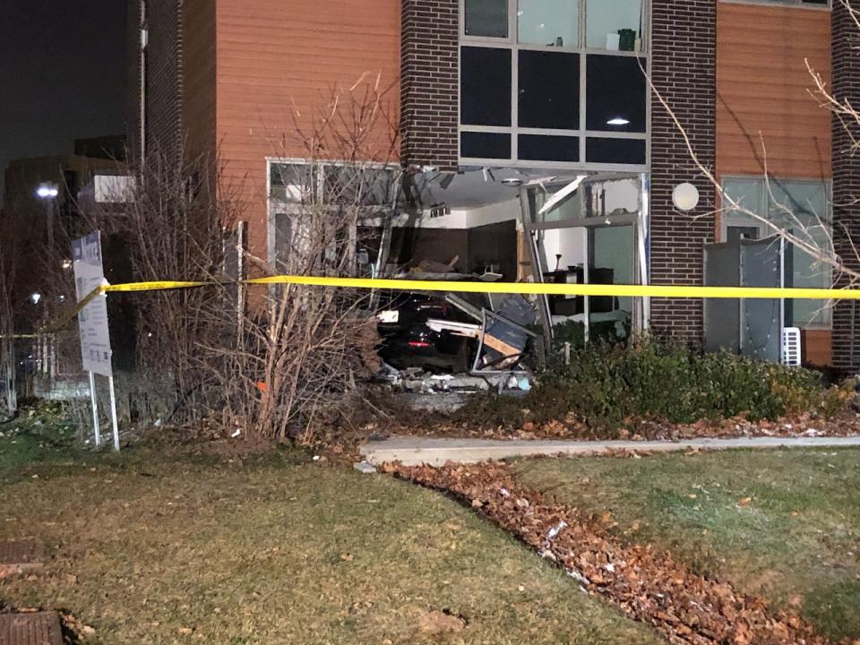 Toronto EMS says five people were sent to hospital after a car crashed into a home overnight in the area of Sheppard Avenue E. and Highway 404. (Clara Pasieka/CBC - image credit)
