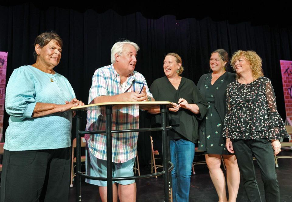 JM Productions of Quincy Executive Director John McDonald, second from left, goes over a scene for his cabaret show that will be presented Sept. 30 at the Woodward School in Quincy with cast members, from left, Sheila Fahey, of Dorchester; Jennifer Fahey, of Dorchester; Music Director Sarah Troxler, of Plymouth, and Ann Kenneally-Ryan, of Quincy, Thursday, Sept. 15, 2022.