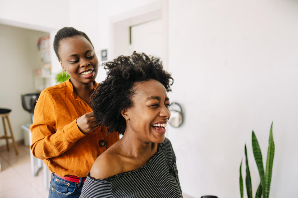 Real, lasting relationships are formed in the salon chair in the Black community, says one writer. (Stock photo/Getty Images)